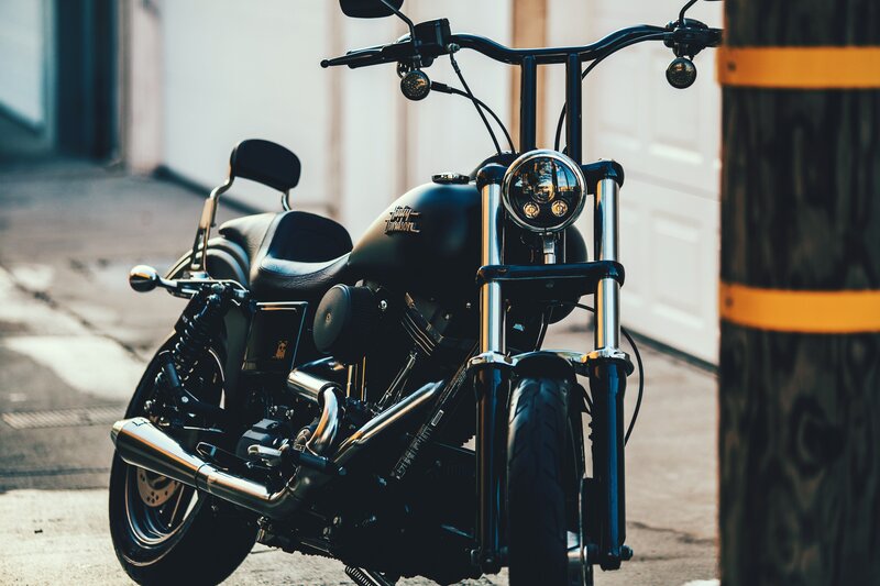 Black Harley-davidson Motorcycle — Calm, Afternoon, Photograph, Pole