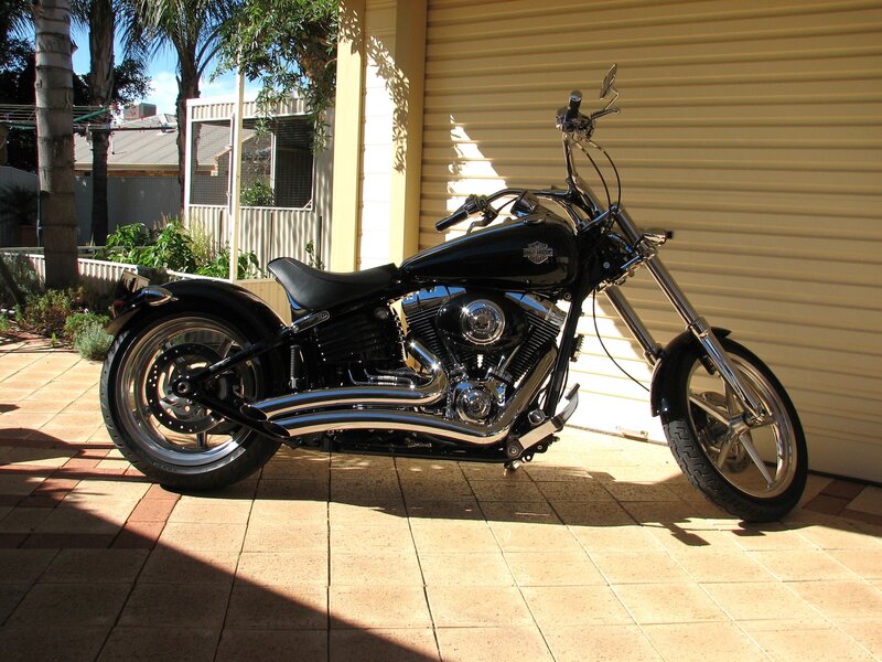 Black Harley-davidson Motorcycle — Calm, Afternoon, Photograph