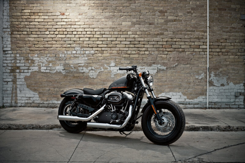 Black Harley-davidson Motorcycle — Dramatic, Photograph, Brick Wall
