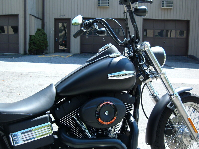 Black Harley-davidson Motorcycle — Neutral, Afternoon, Photograph, Building, Garage Doors