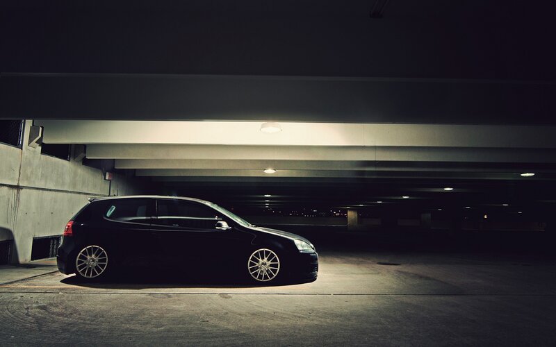 Black Hatchback Car — Dramatic, Night, Photograph, Parking Garage, Light