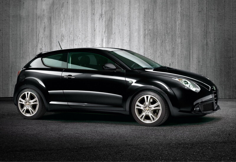 Black Hatchback Car — Dramatic, Photograph, Concrete Wall