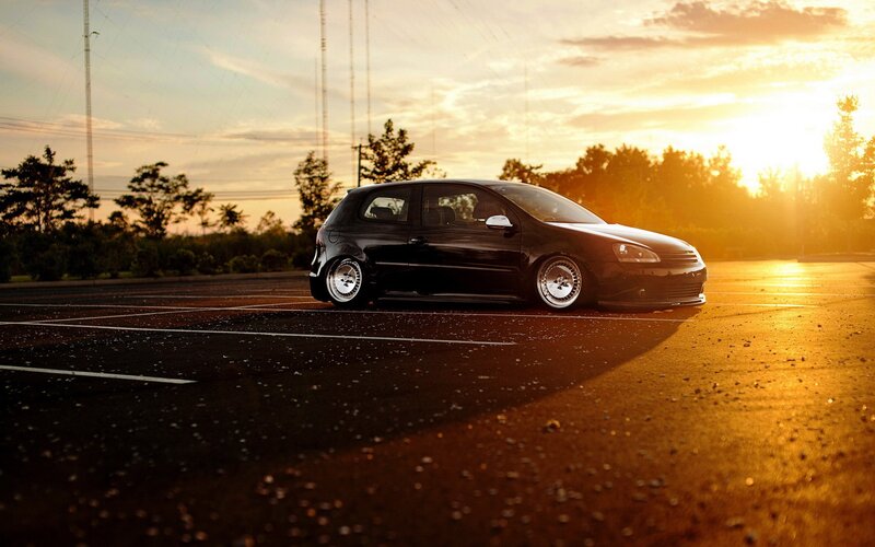 Black Hatchback Car — Dramatic, Sunset, Photograph