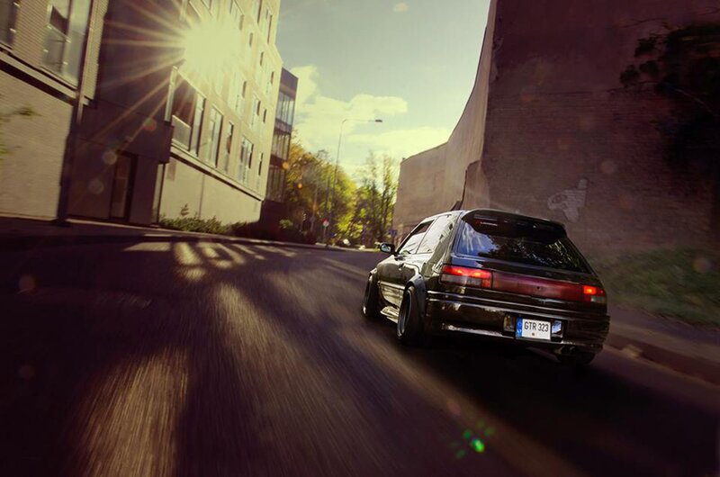 Black Hatchback Car — Dramatic, Sunset