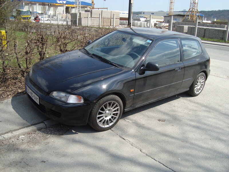 Black hatchback car parked