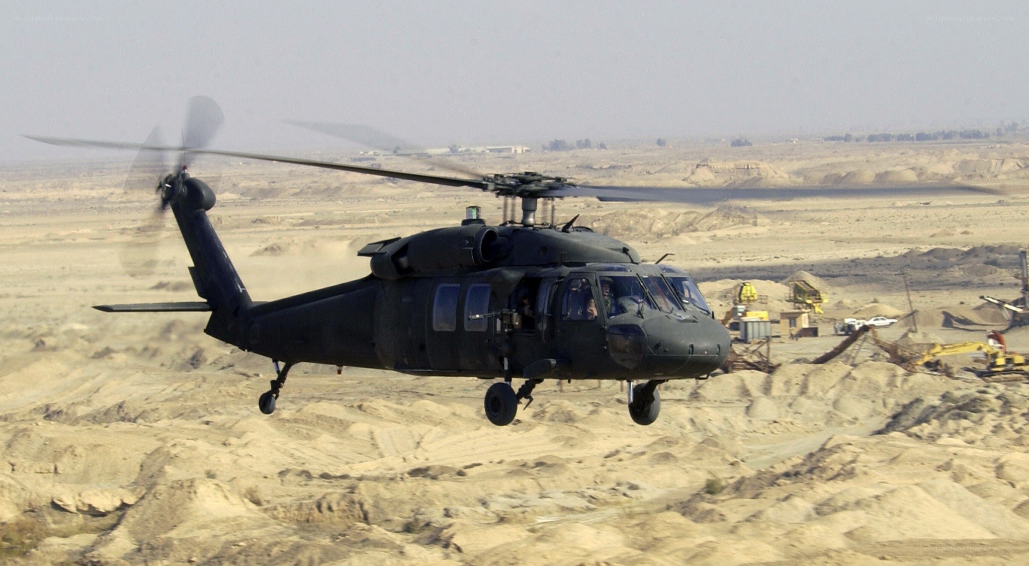 Black Hawk helicopter in desert