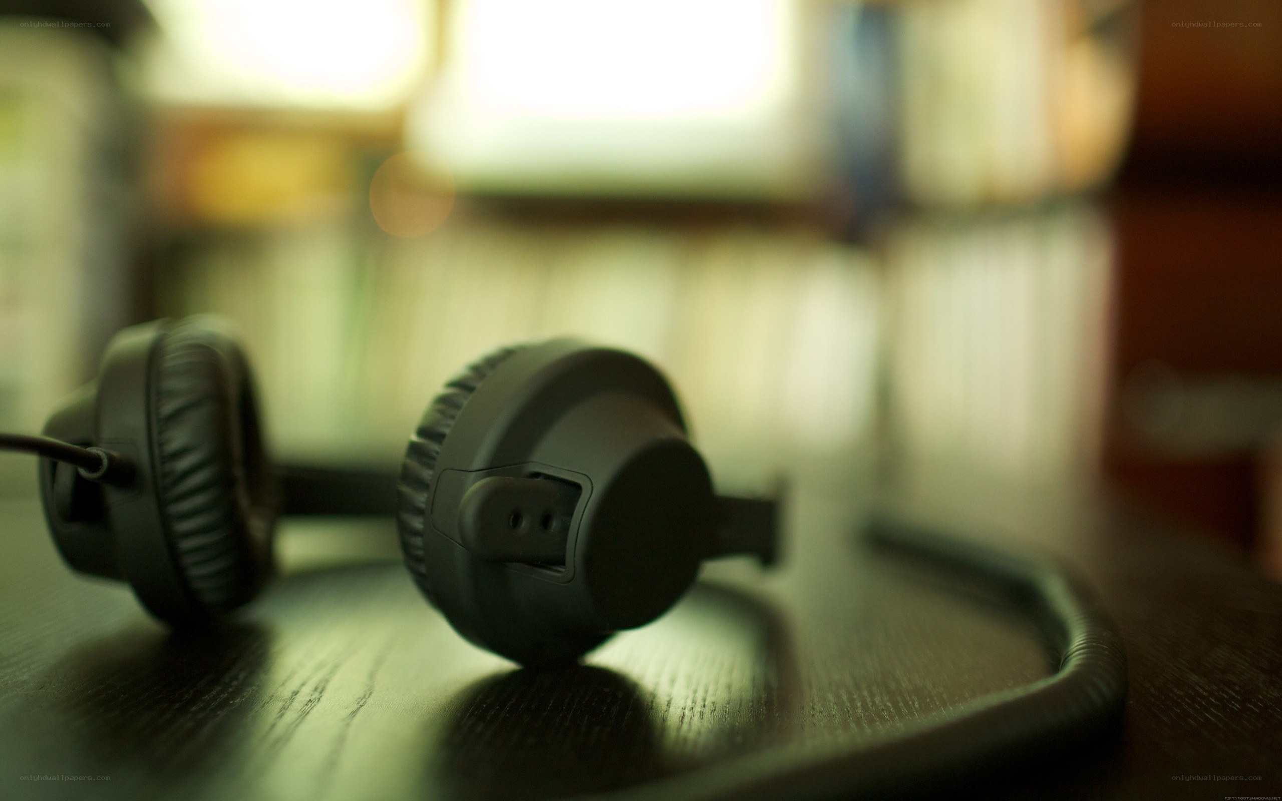 black headphones on a table