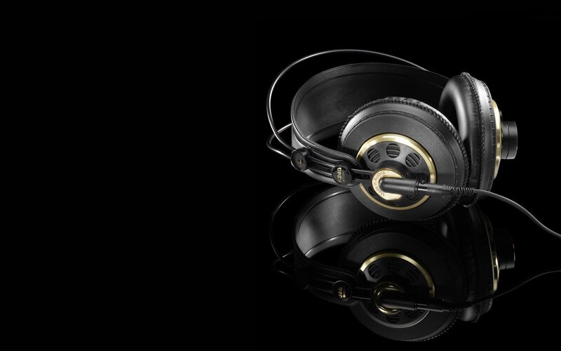 black headphones on black background