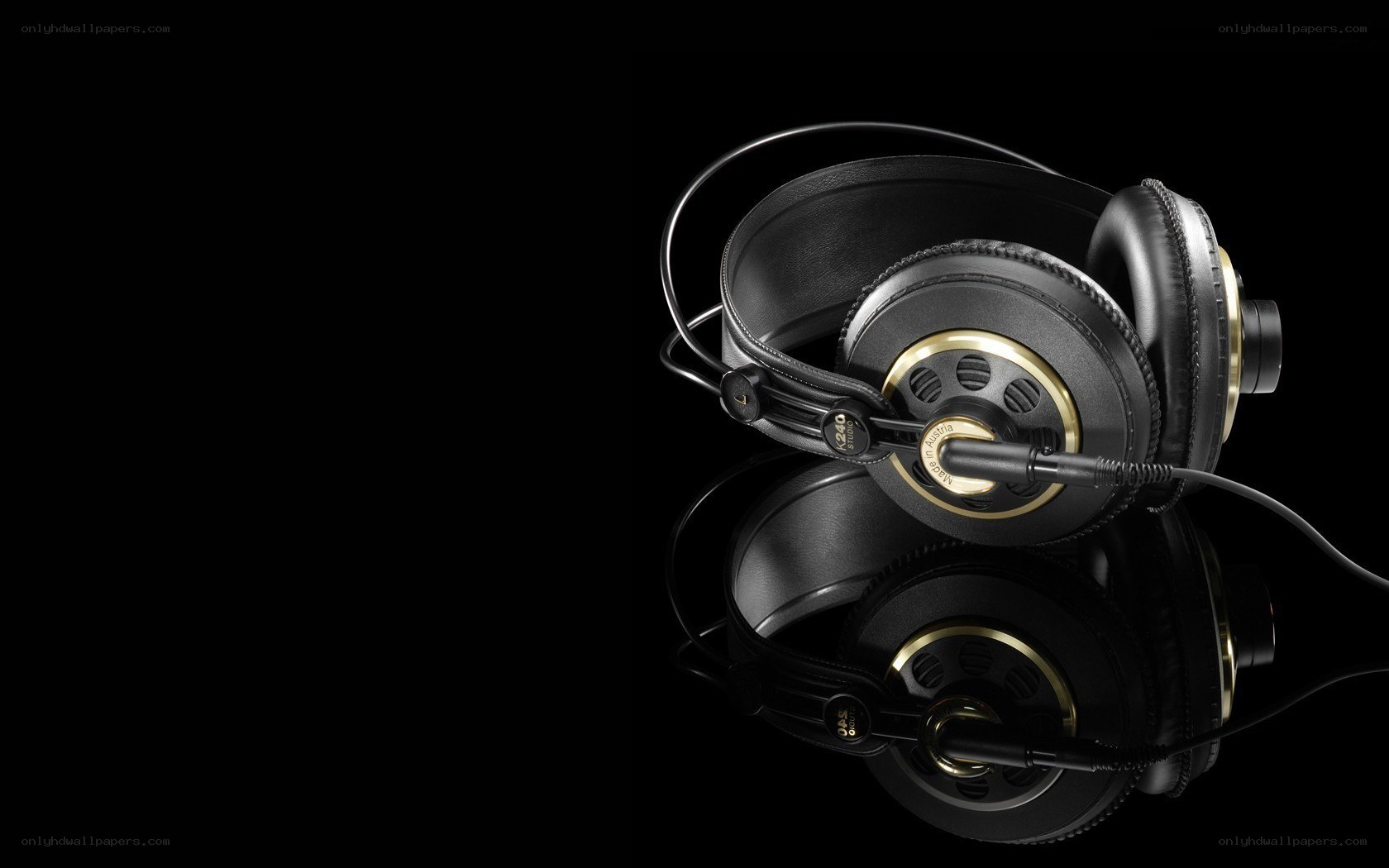 black headphones on black background