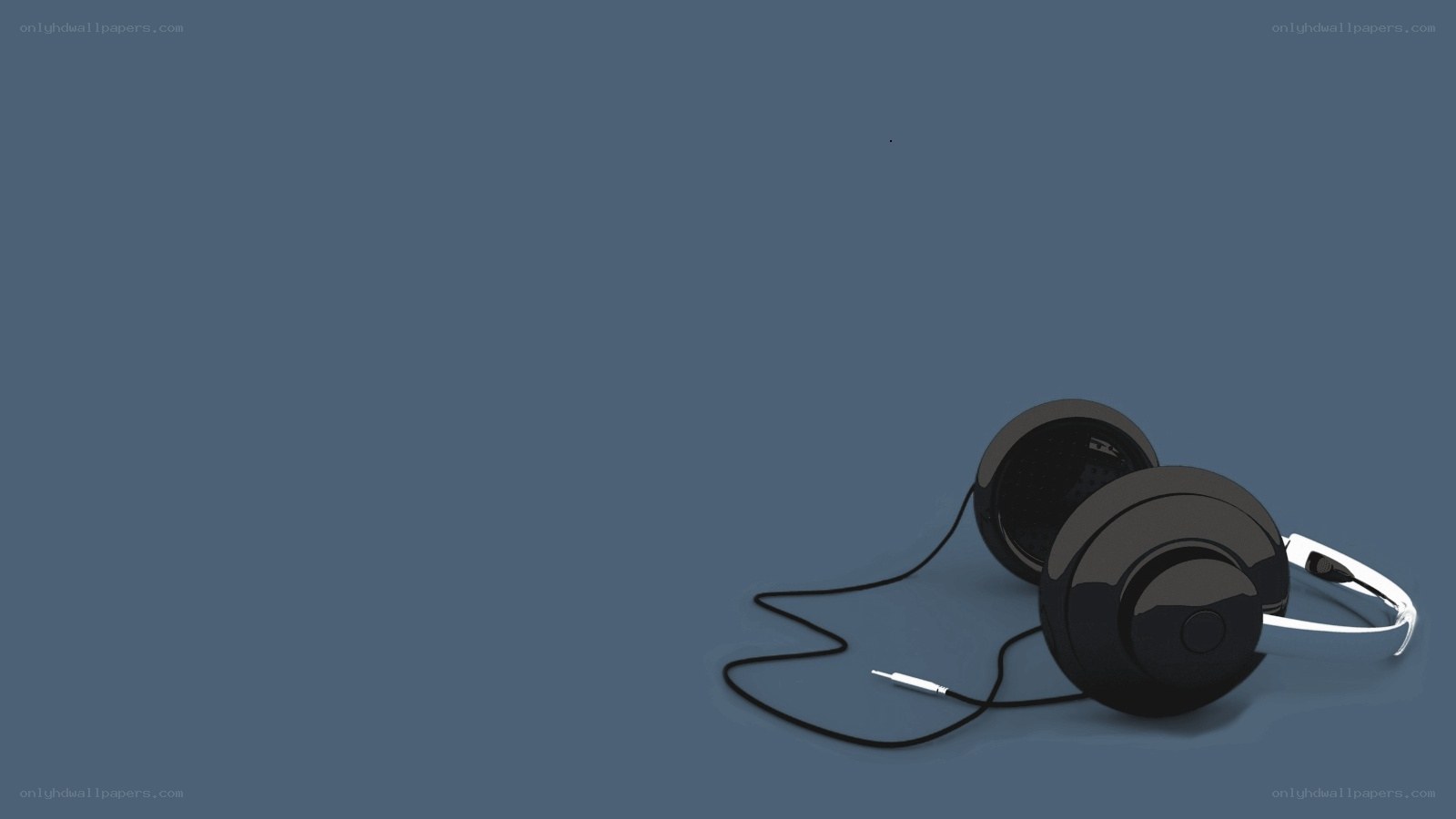black headphones on blue background