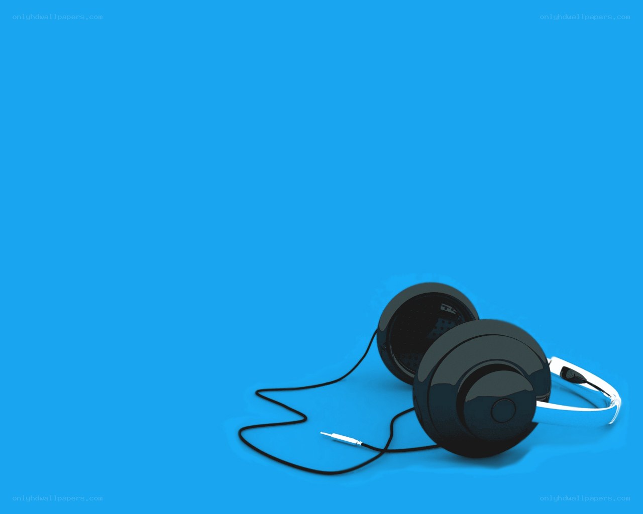 black headphones on blue