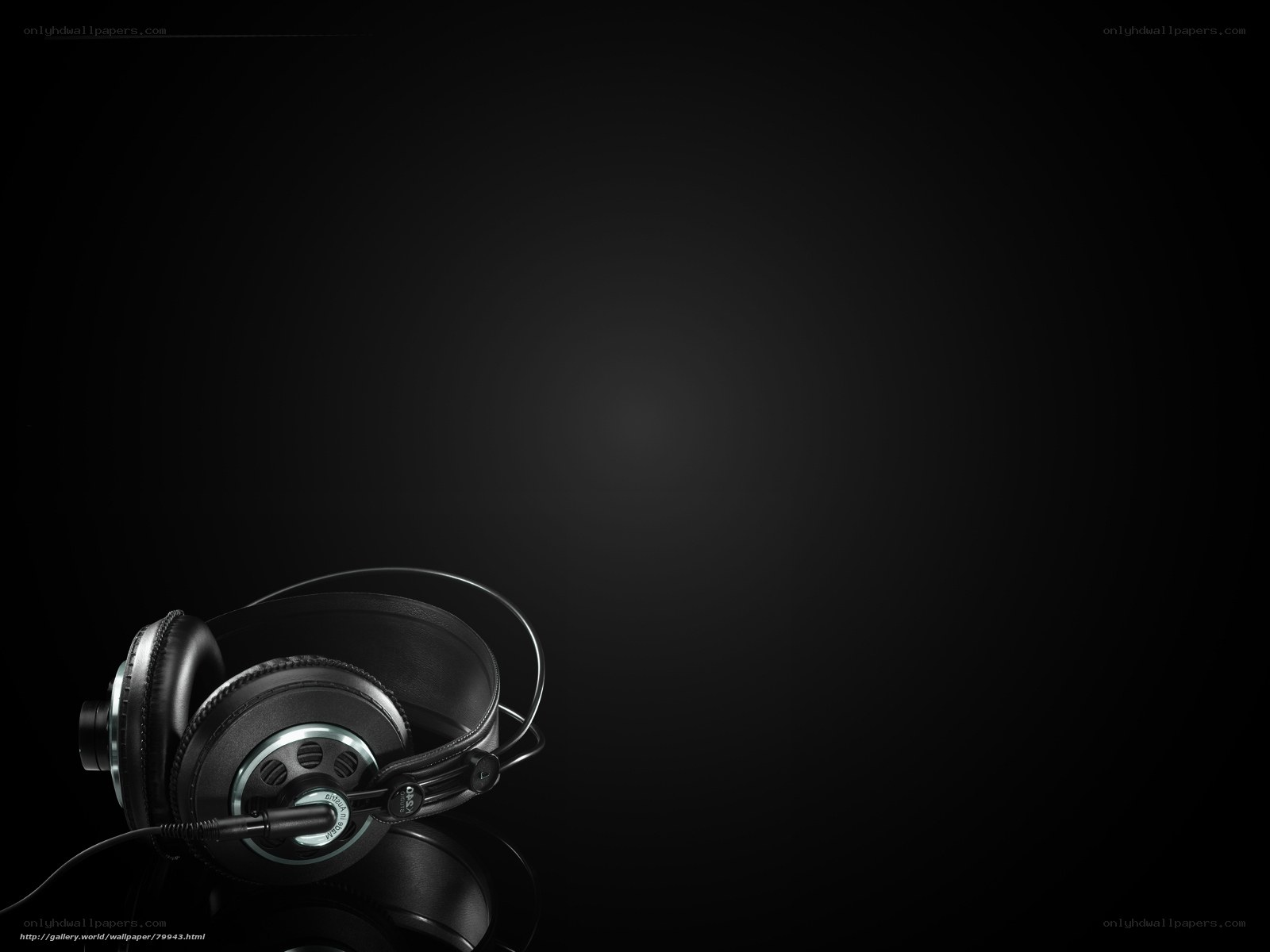 black headphones on dark background