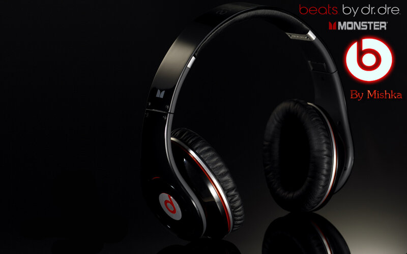 Black Headphones on Dark Surface — Dramatic