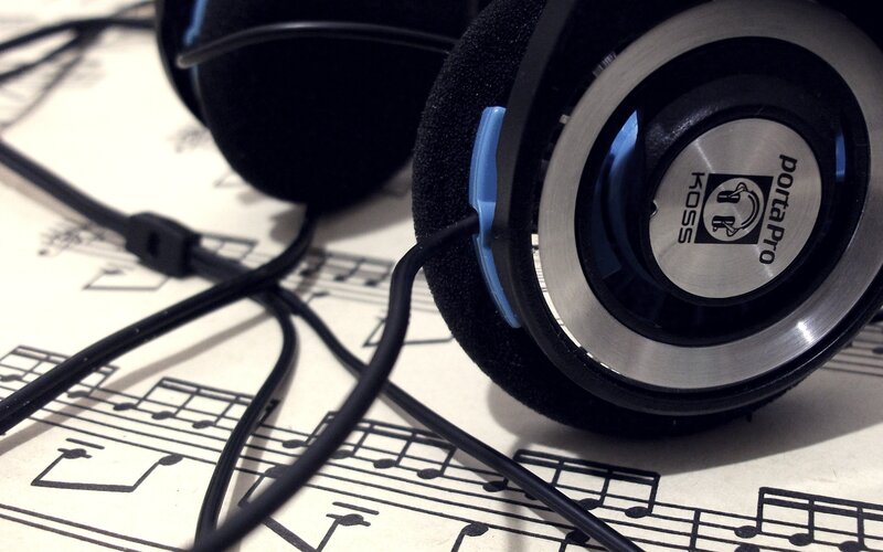 Black Headphones on Sheet Music