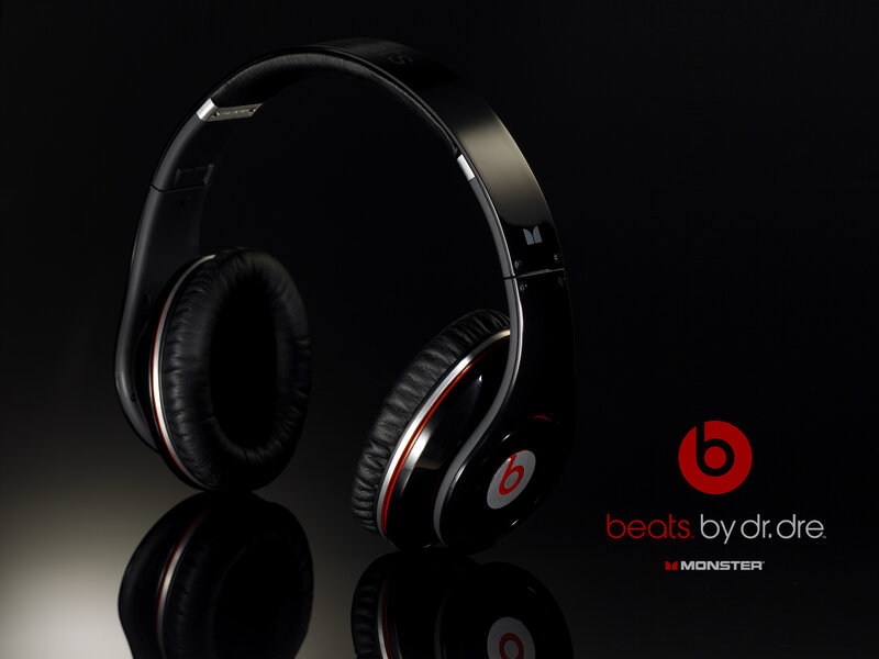 Black Headphones on Surface — Dramatic