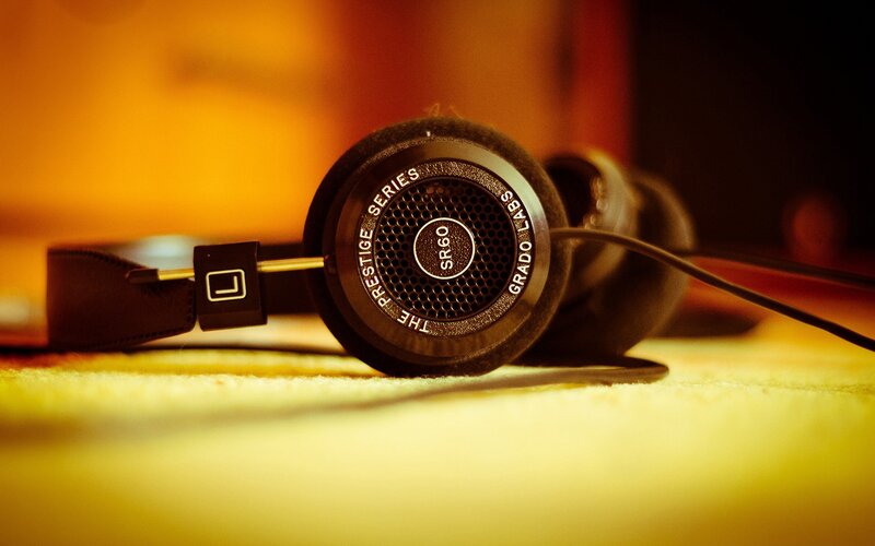 Black Headphones on Surface — Yellow