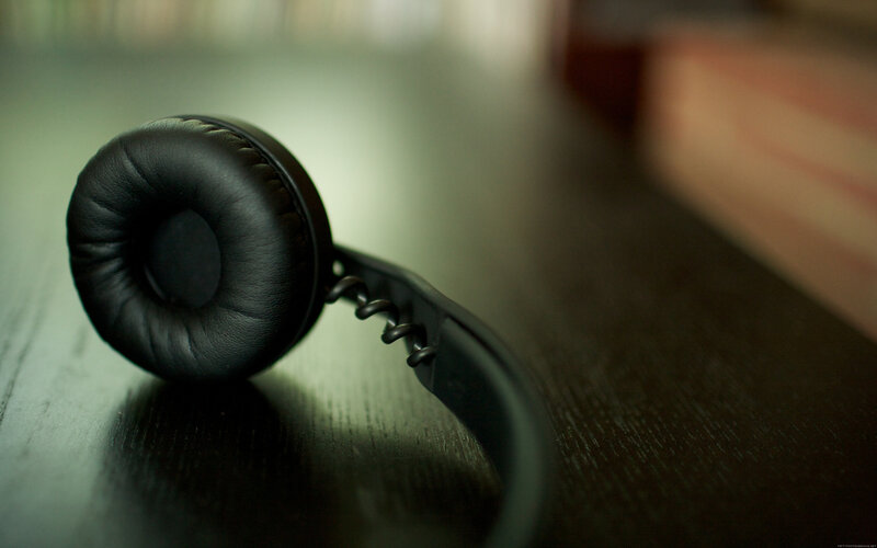 black headphones on table