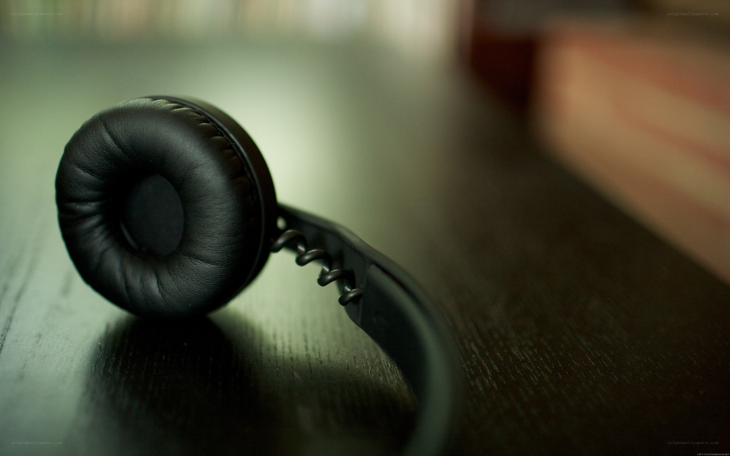 black headphones on table