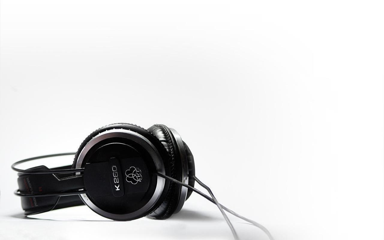 black headphones on white background