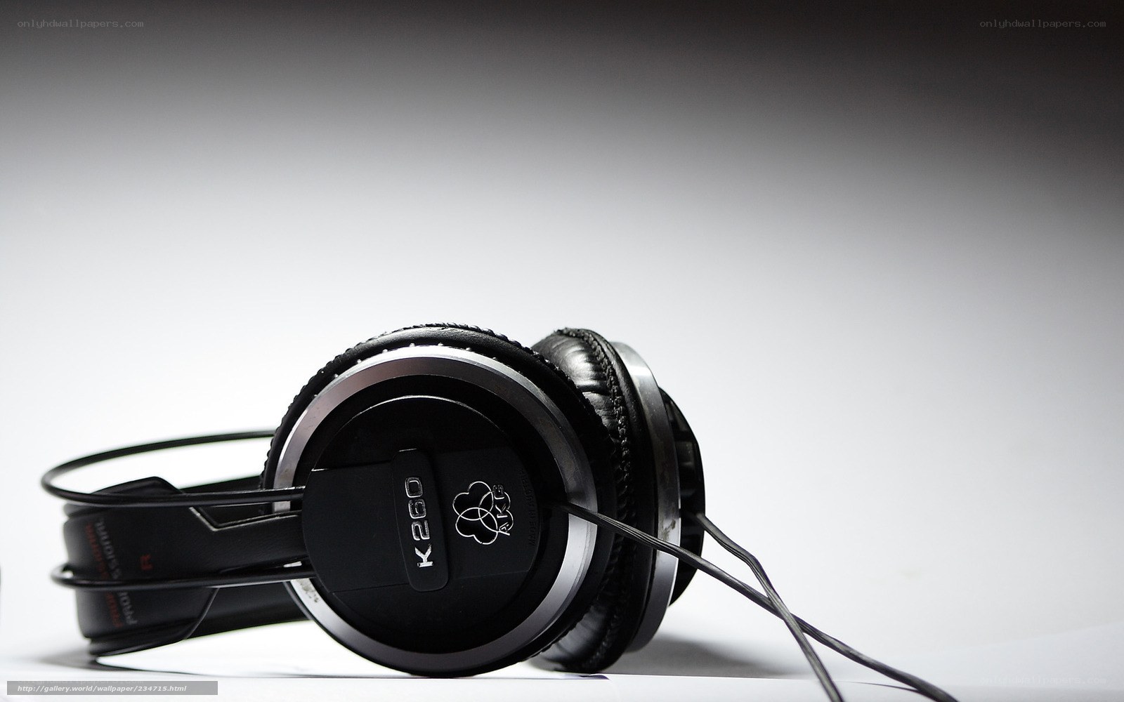 black headphones on white surface