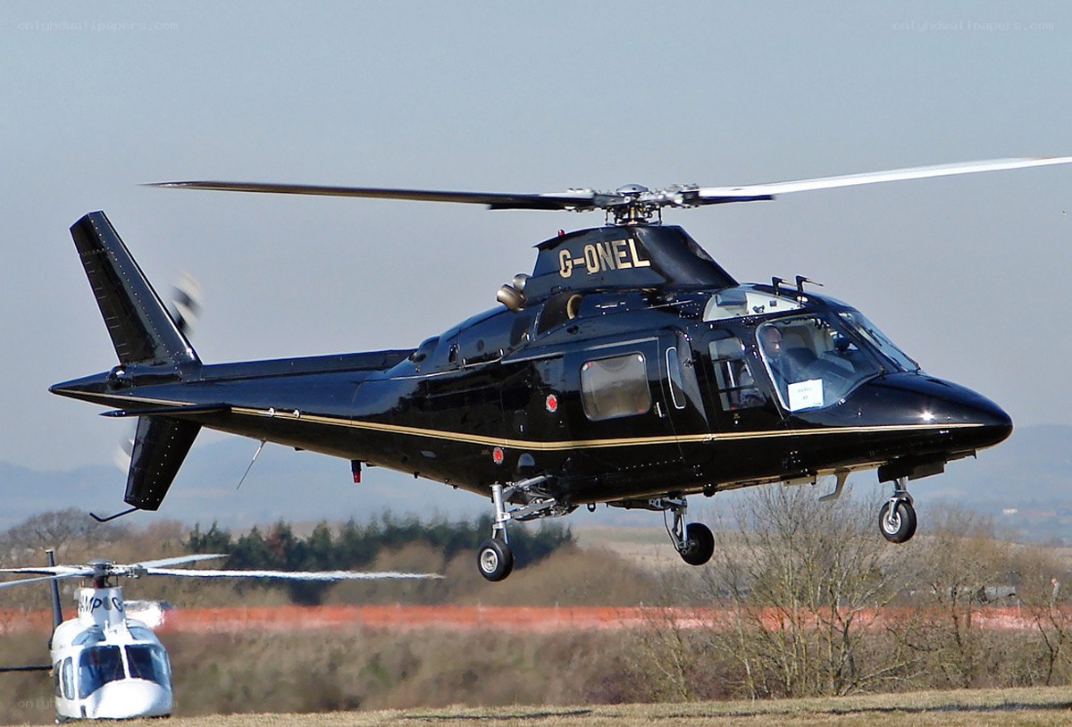 Black helicopter in flight
