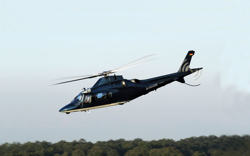 black helicopter in flight