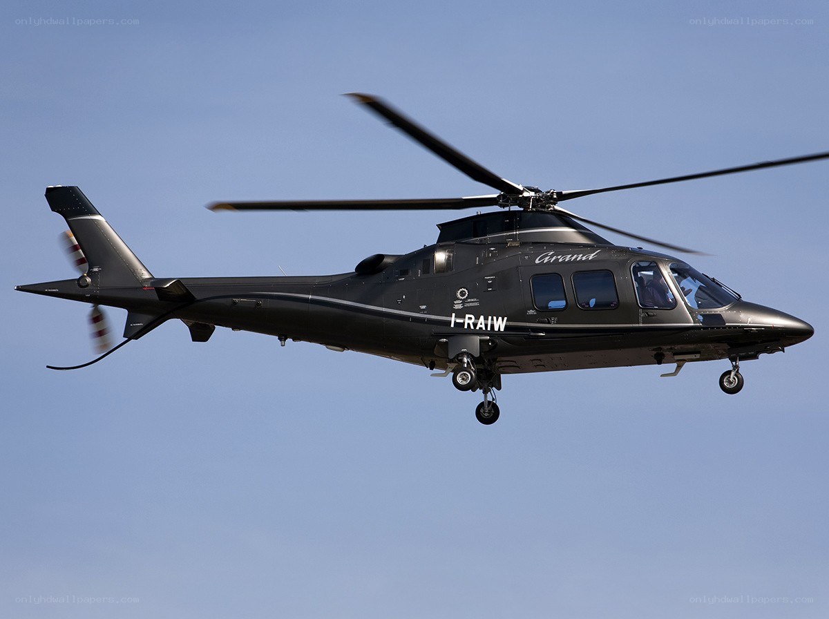 Black helicopter in flight