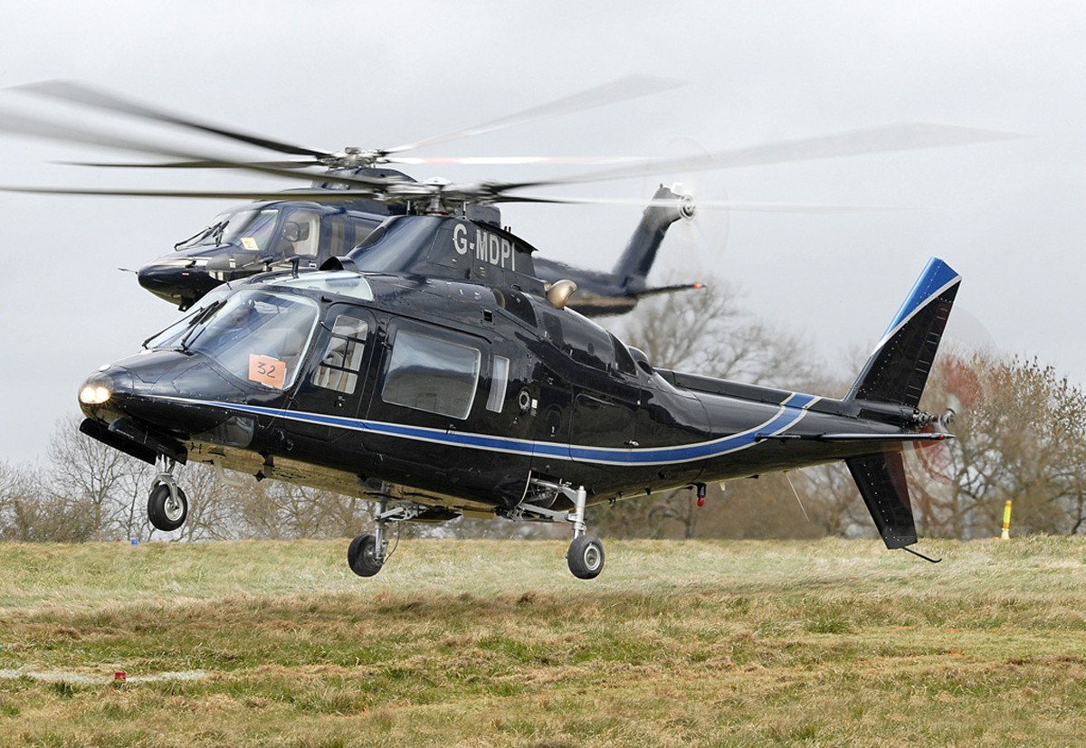 Black helicopter in flight