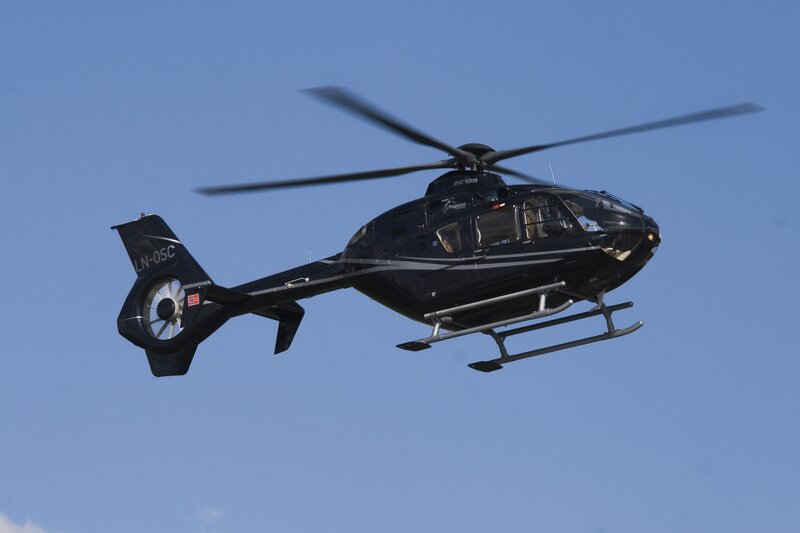 Black Helicopter in Flight — Blue, Calm