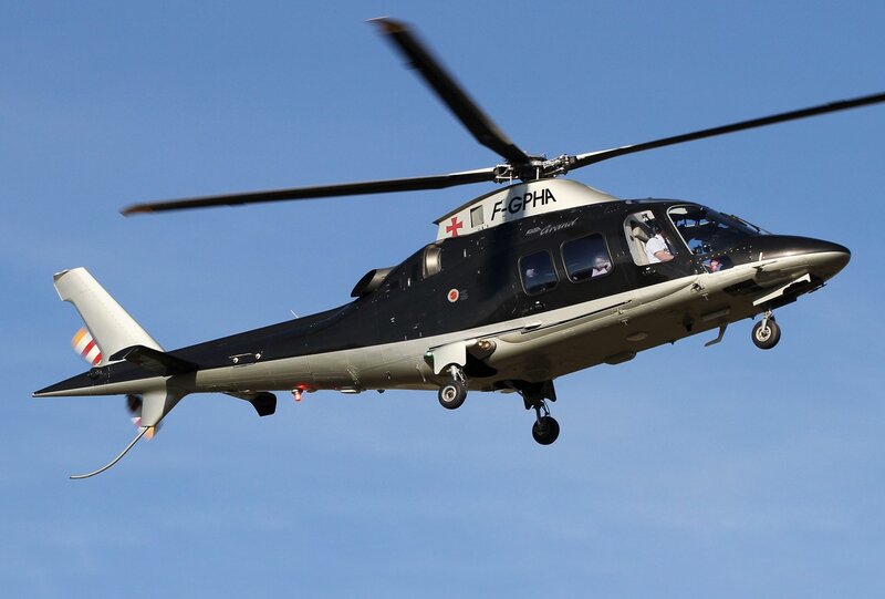 Black Helicopter in Flight — Blue, Clear
