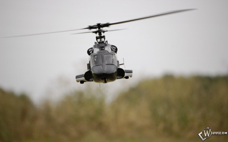 Black Helicopter in Flight — Gray