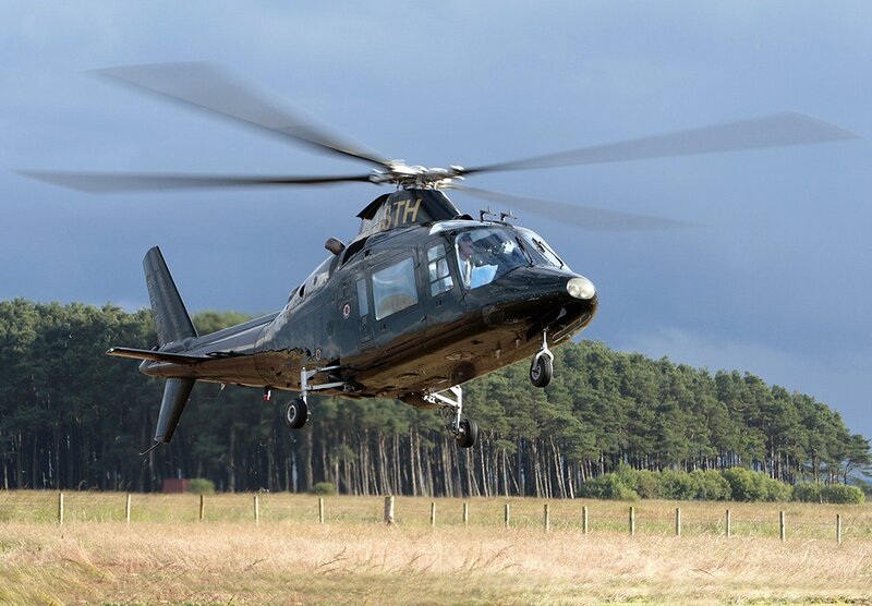 Black Helicopter in Flight — Green, Dramatic