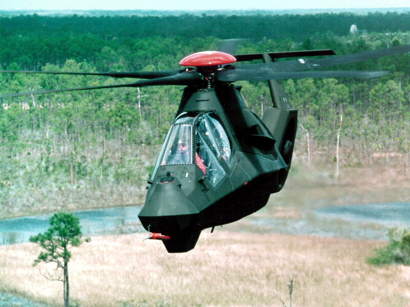 Black Helicopter in Flight — Green