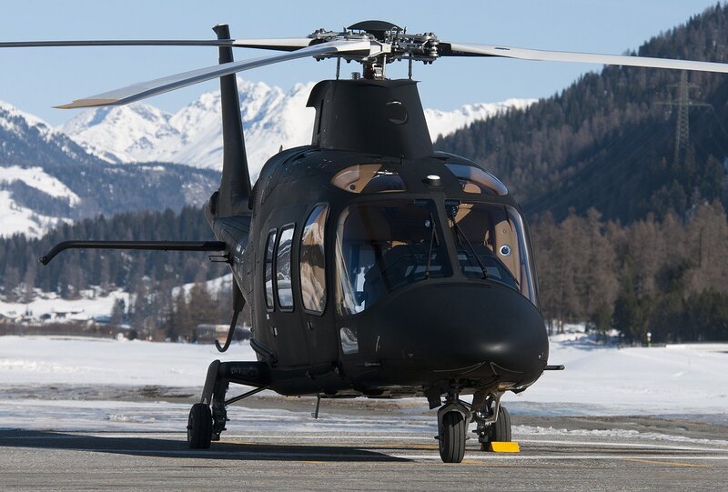 Black Helicopter on Tarmac — Serene