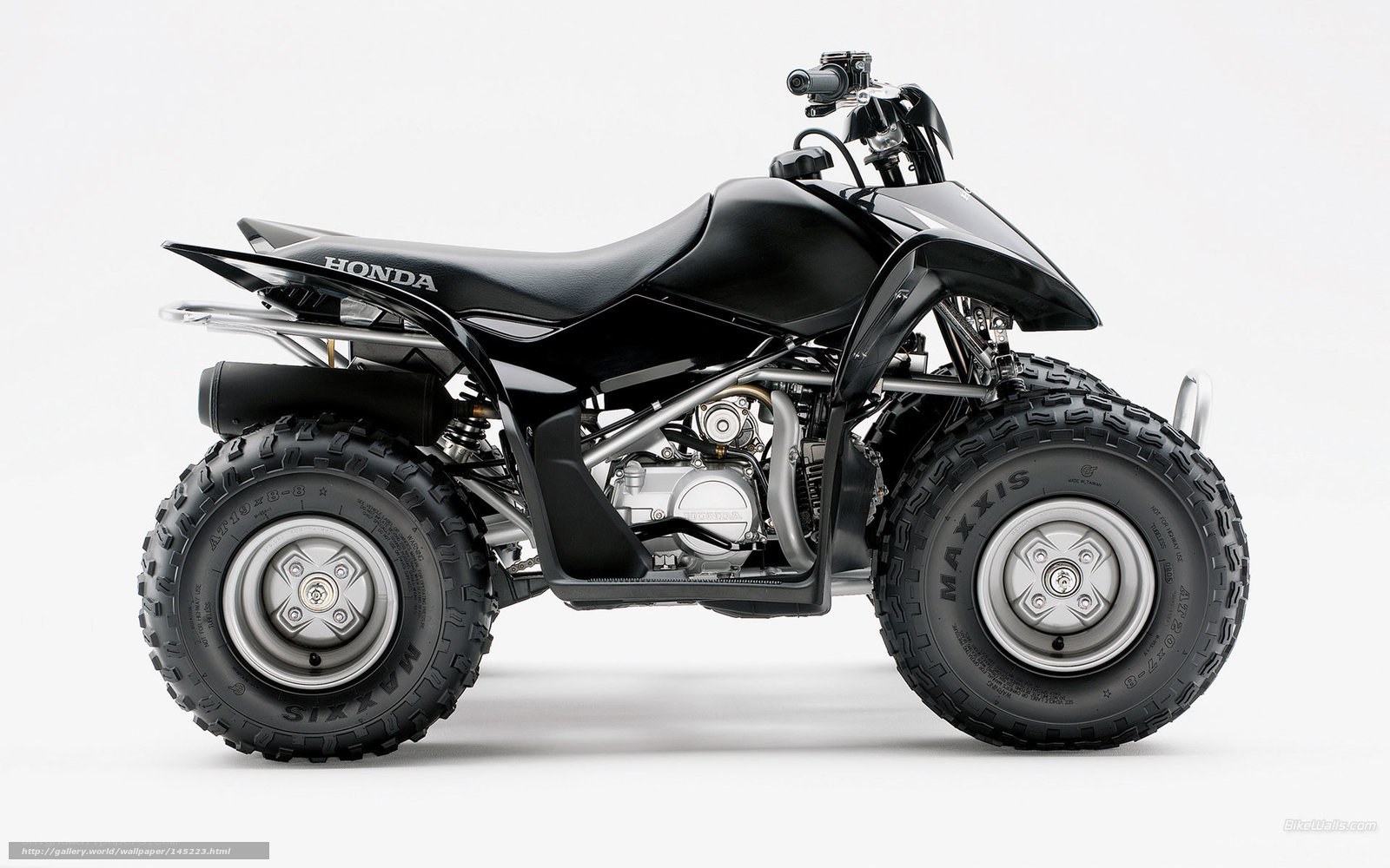 Black Honda ATV side profile