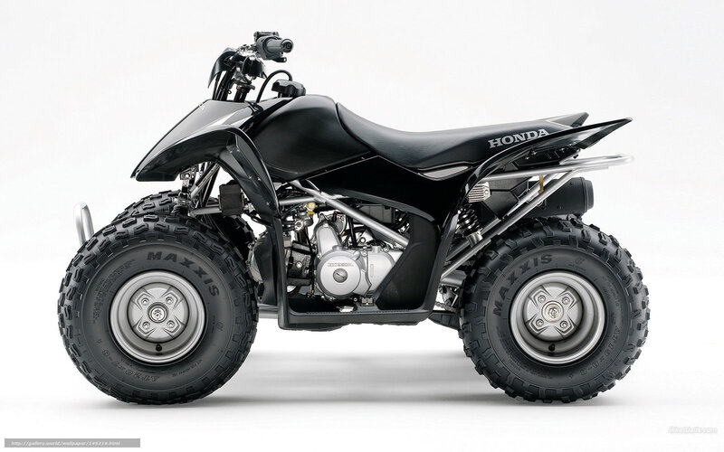Black Honda ATV side profile