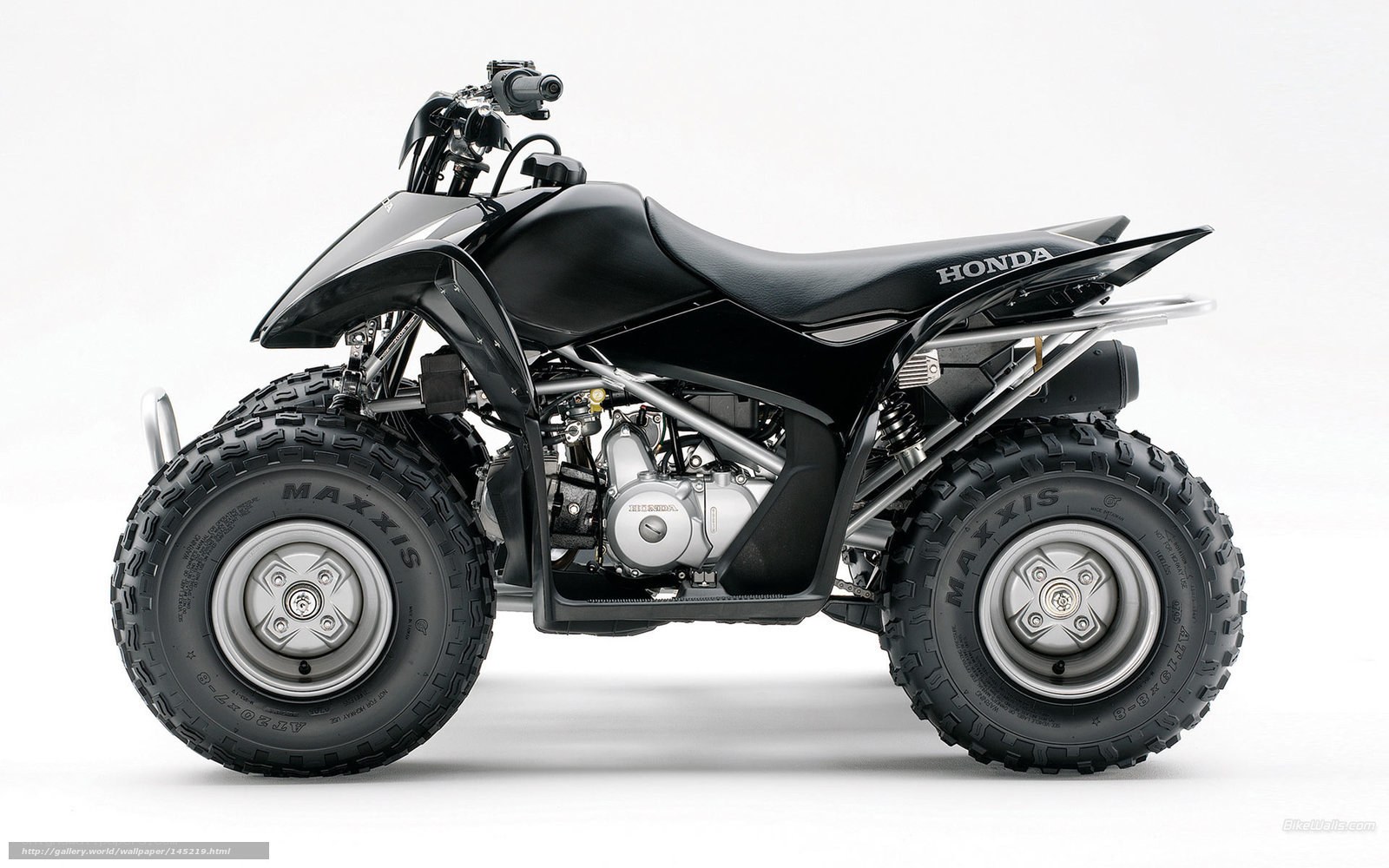 Black Honda ATV side profile