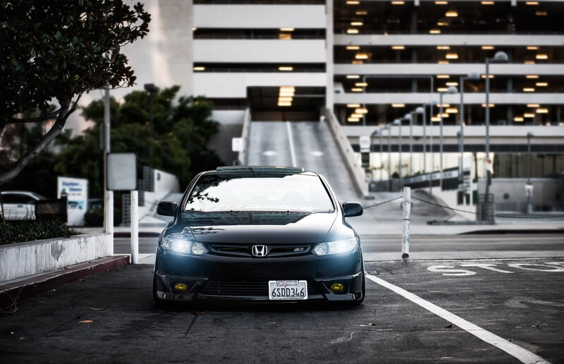 Black Honda Civic in parking lot