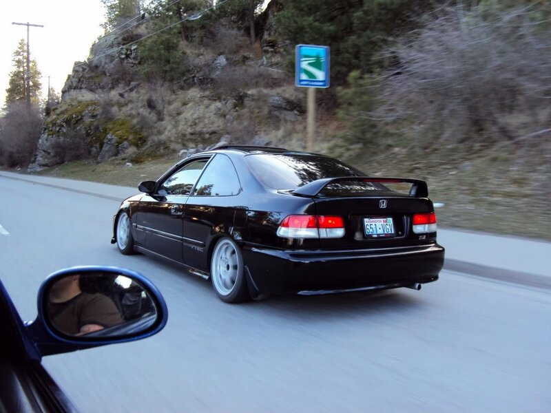 black honda civic on road