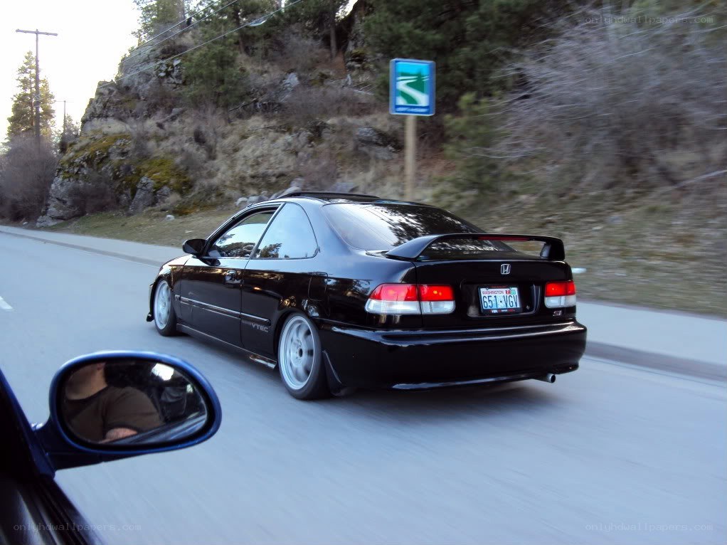 black honda civic on road