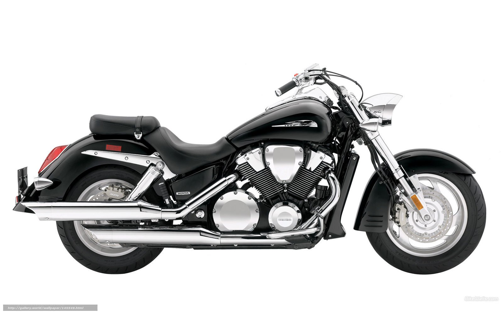black Honda cruiser motorcycle