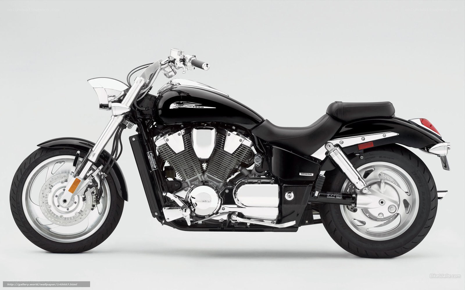 black Honda cruiser motorcycle