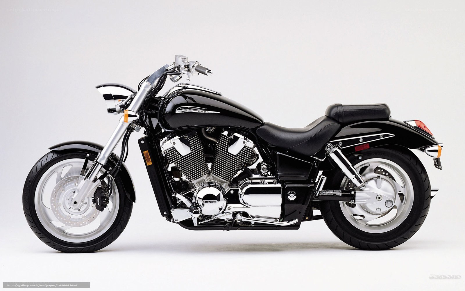 black honda cruiser motorcycle