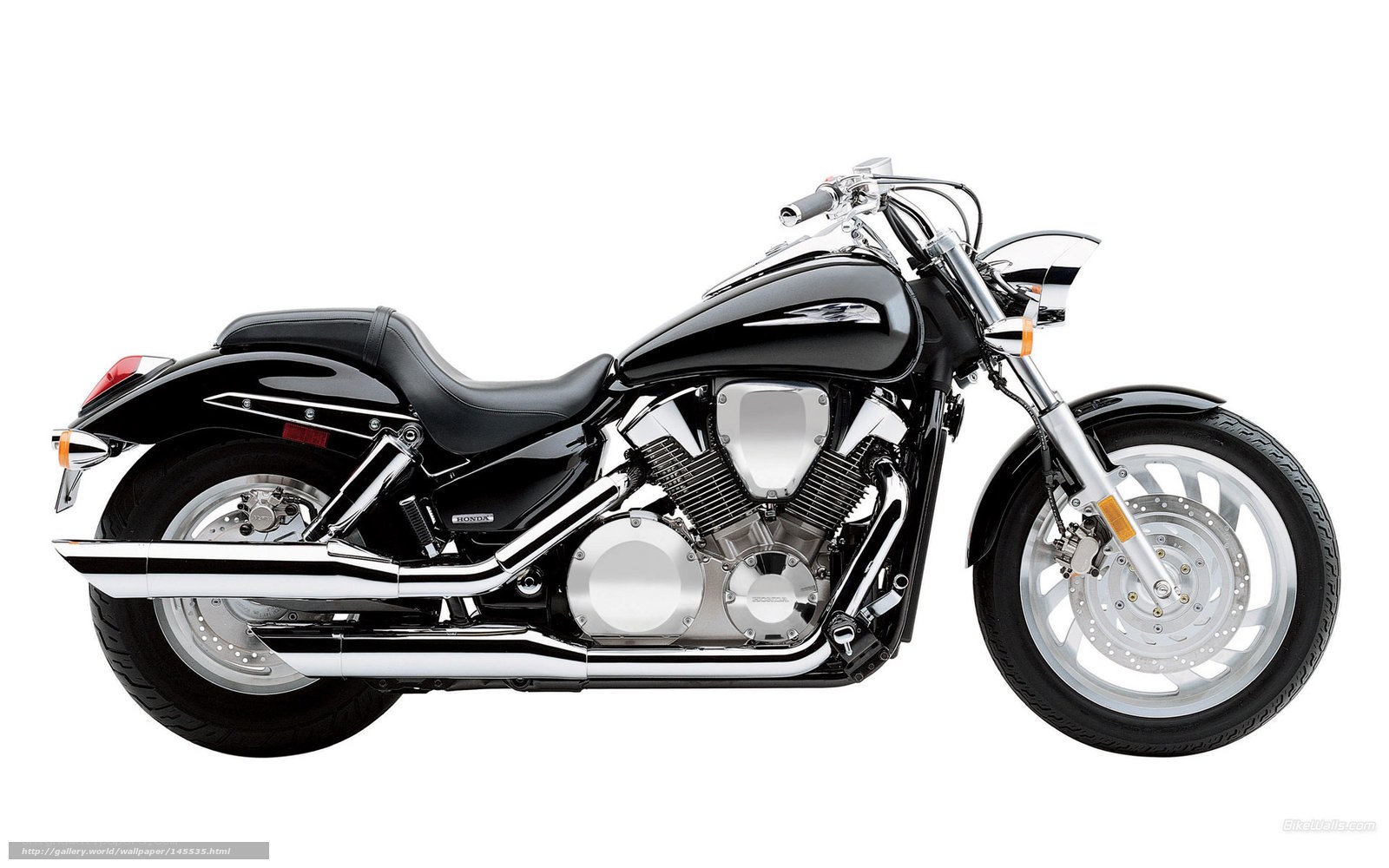 black Honda cruiser motorcycle