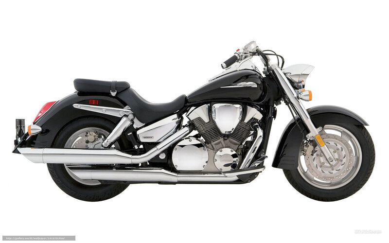 black Honda cruiser motorcycle