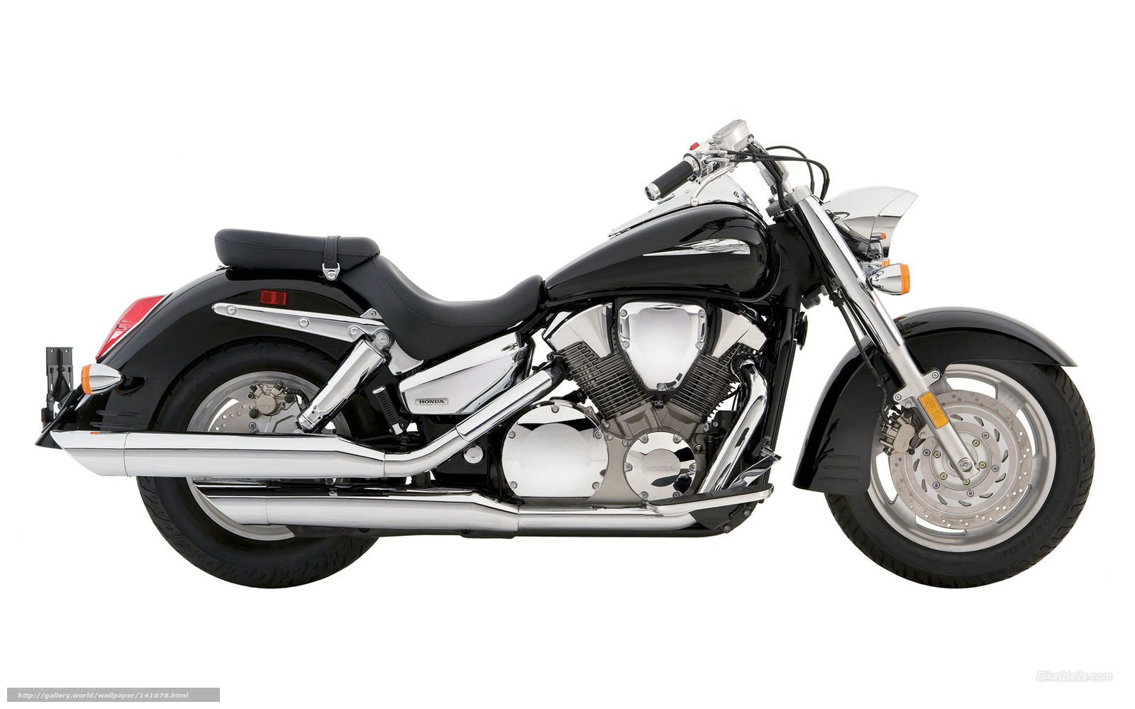 black Honda cruiser motorcycle