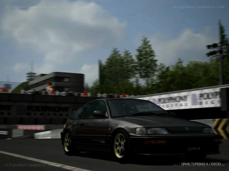 Black Honda CRX on a racetrack