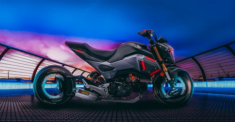 Black Honda Motorcycle — Blue