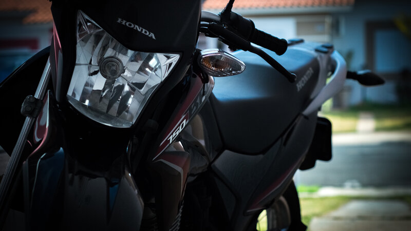 Black Honda Motorcycle — Dramatic
