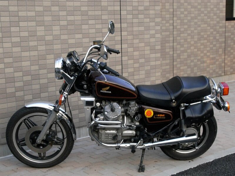Black Honda Motorcycle — Neutral, Photograph, Saddlebag